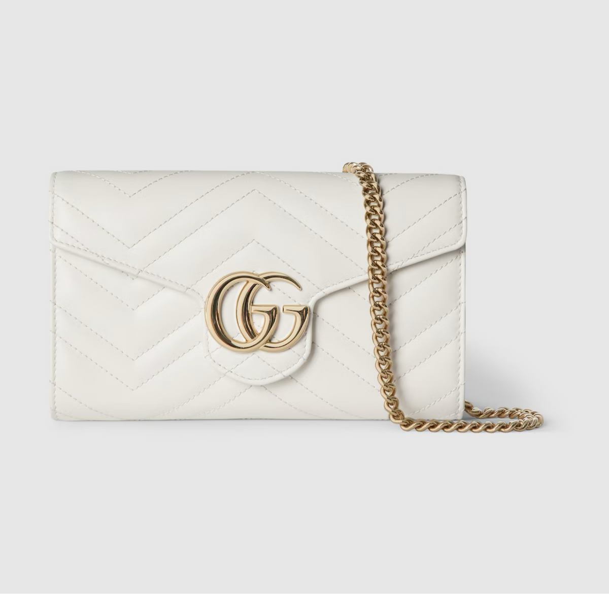 GG MARMONT WALLET IS HANGING IN A SERIES