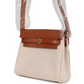 حقيبة Herbag Zip 20 ميني من قماش Toile H باللونين الإيكرو والبيج مع جلد Vache Hunter باللون الفوف وأجزاء معدنية من ذهب