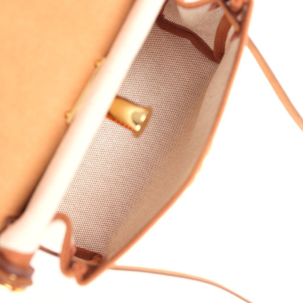 حقيبة Herbag Zip 20 ميني من قماش Toile H باللونين الإيكرو والبيج مع جلد Vache Hunter باللون الفوف وأجزاء معدنية من ذهب