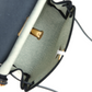 حقيبة Herbag Zip 20 ميني بلون إيكرو وأخضر موين من قماش Toile H وجلد Vache Hunter الأسود مع قطع معدنية من ذهب